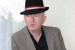 Alan McGee may be returning to the music business to “cause chaos in the world of Simon Cowell”
