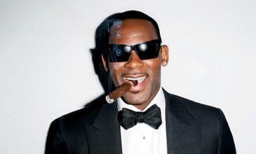 R. Kelly continues to live the world’s most absurd life, this time embroiled in a strip club non-appearance with his rider revealed