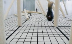 Kiani Del Valle navigates Claudia Comte’s felled forest installation in I Have Grown Taller from Standing with Trees